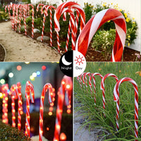 1 x RAW Customer Returns Candy cane LED fairy lights outdoor set of 10, 55cm height 60 LEDs red with 8 modes illuminated Christmas path marker landscape path light Christmas lighting decoration for Christmas garden decoration - RRP €39.31