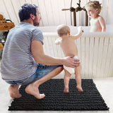 1 x RAW Customer Returns DEXI bathroom rug 40 x 60 cm, chenille bath mat, non-slip, soft bath mat, machine washable, microfibre absorbent bath mat for bathtub, shower and bathroom - black - RRP €19.99