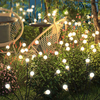 1 x RAW Customer Returns Kizozo Solar Lights Outdoor 4 Pieces, Solar Fireflies with 10 LED Lights, IP65 Waterproof Solar Garden Lights, Outdoor Solar Lights, Outdoor Garden Decoration, Warm White - RRP €29.99