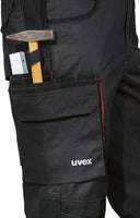 1 x RAW Customer Returns Uvex Tune-up Men s Long Work Pants with Knee Pockets, Black Active Red, 48 - RRP €90.74