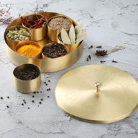 1 x RAW Customer Returns Ajuny Handmade Round Brass Spice Jar with Embossed Lid - Golden Tree Design - 8 Width x 1.75 Height 7 Spice Containers and 1 Designer Spoon, Masala Canister, Spice Organizer - RRP €63.71